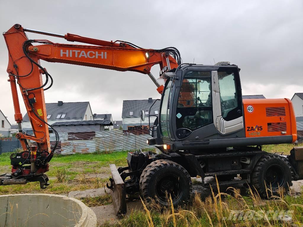 Hitachi ZX 140 W-5 Pelle sur pneus