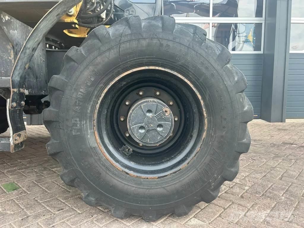 CAT M313D Pelle sur pneus