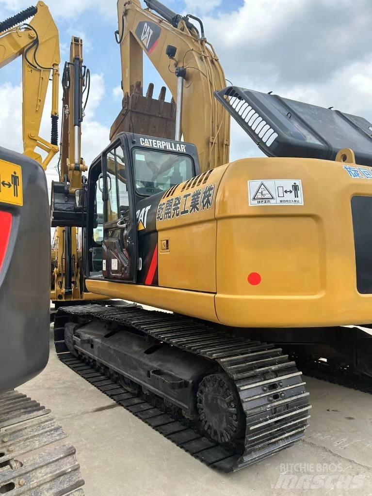 CAT CAT323D Pelle sur chenilles