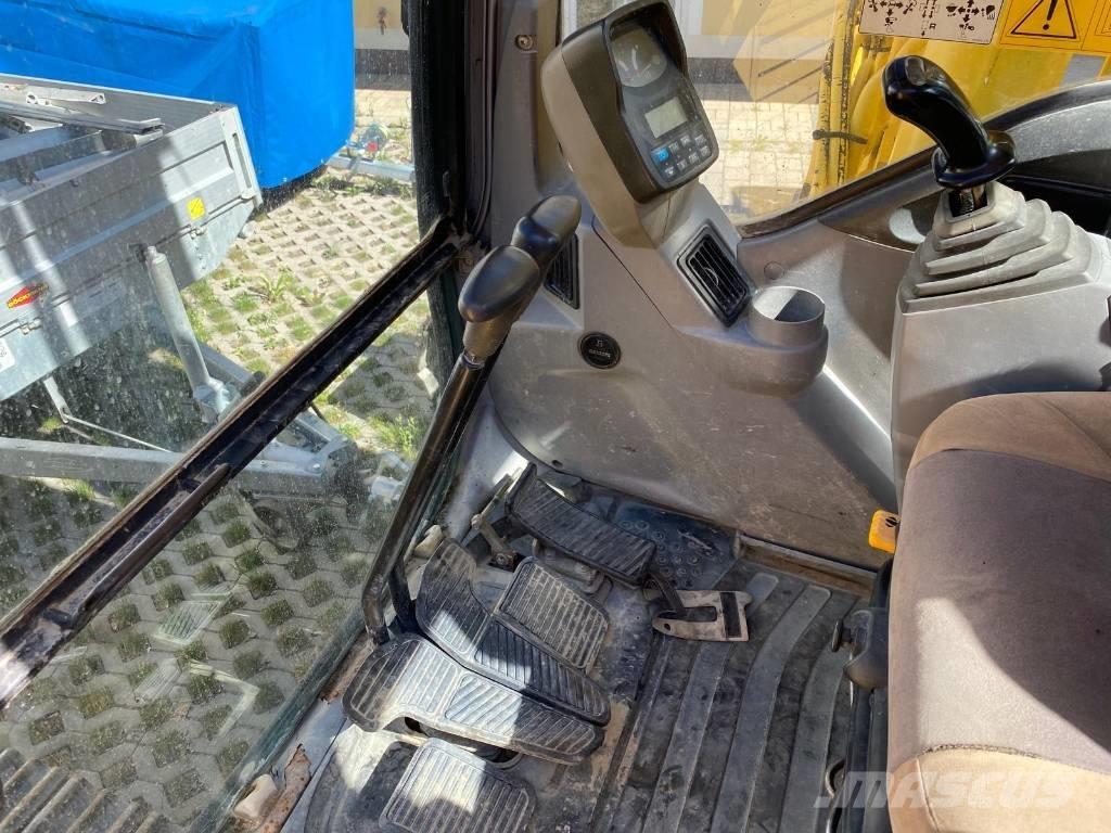 New Holland E 215 Pelle sur chenilles