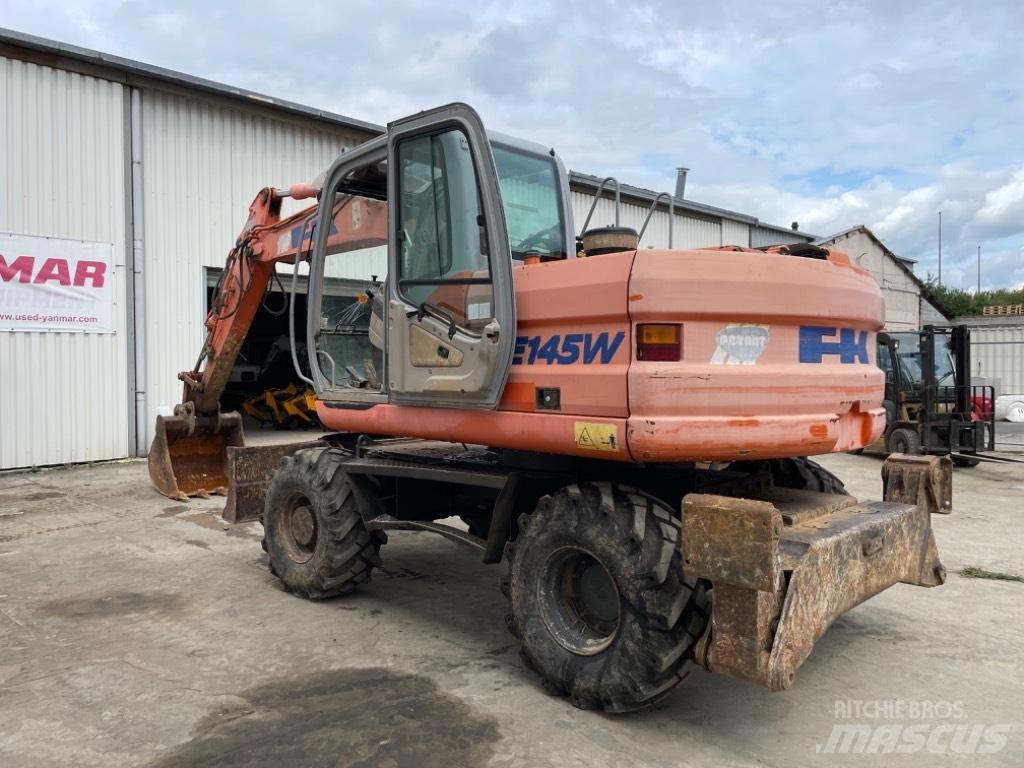 Kobelco E145W Pelle sur pneus