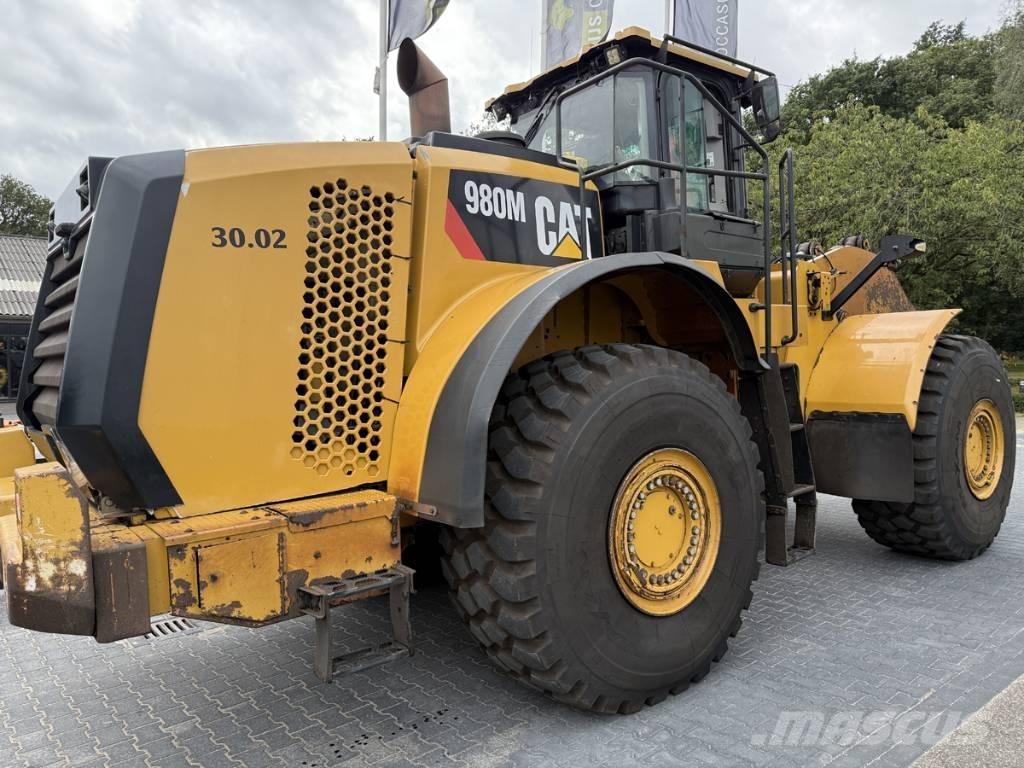 CAT 980M shovel + Bak Chargeuse sur pneus