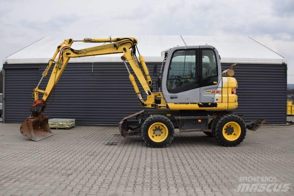 New Holland MH 2.6 Pelle sur pneus