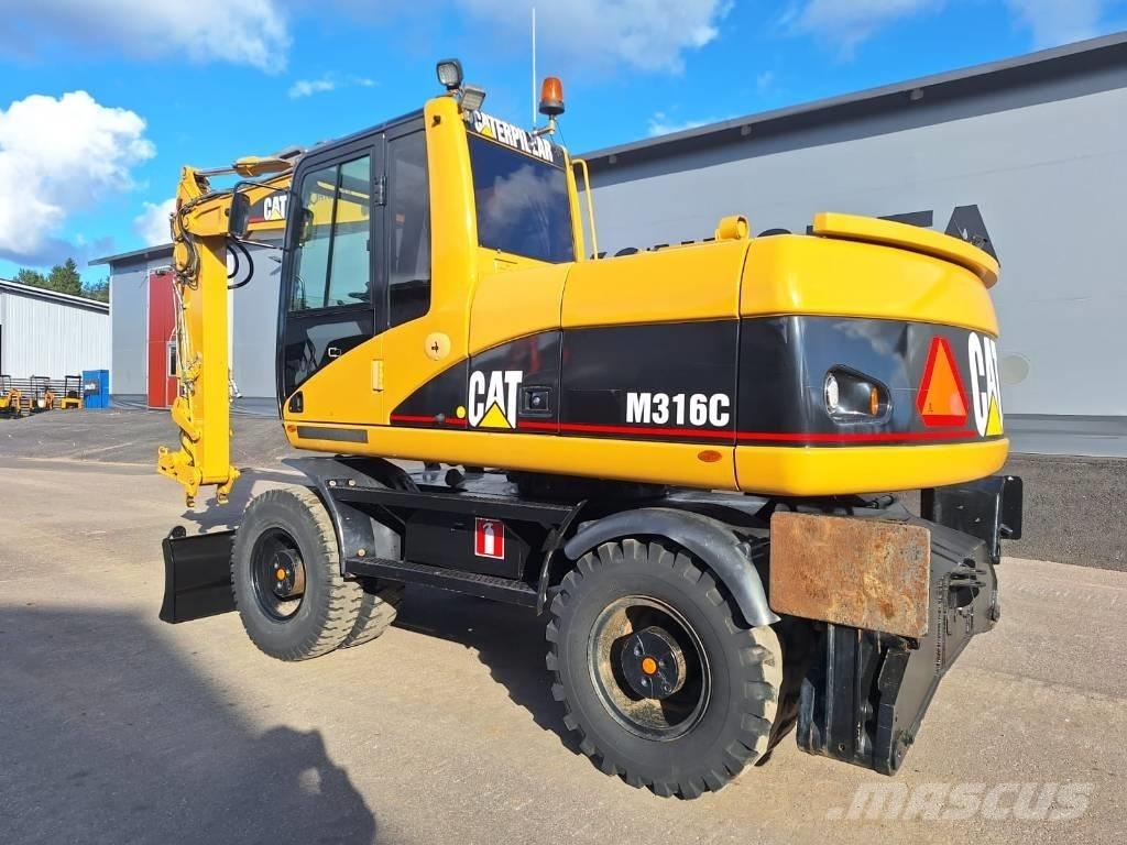 CAT M316C Pelle sur pneus