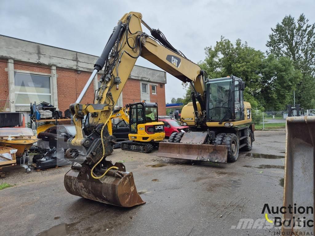 CAT M 315 D Pelle sur pneus