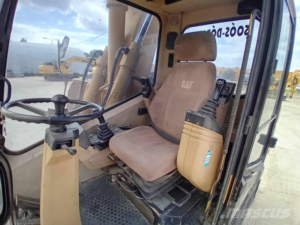 CAT M 315 Pelle sur pneus