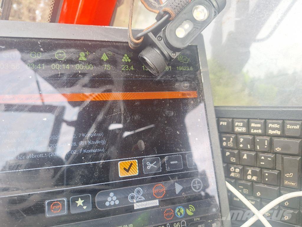 Komatsu 911 Abatteuse