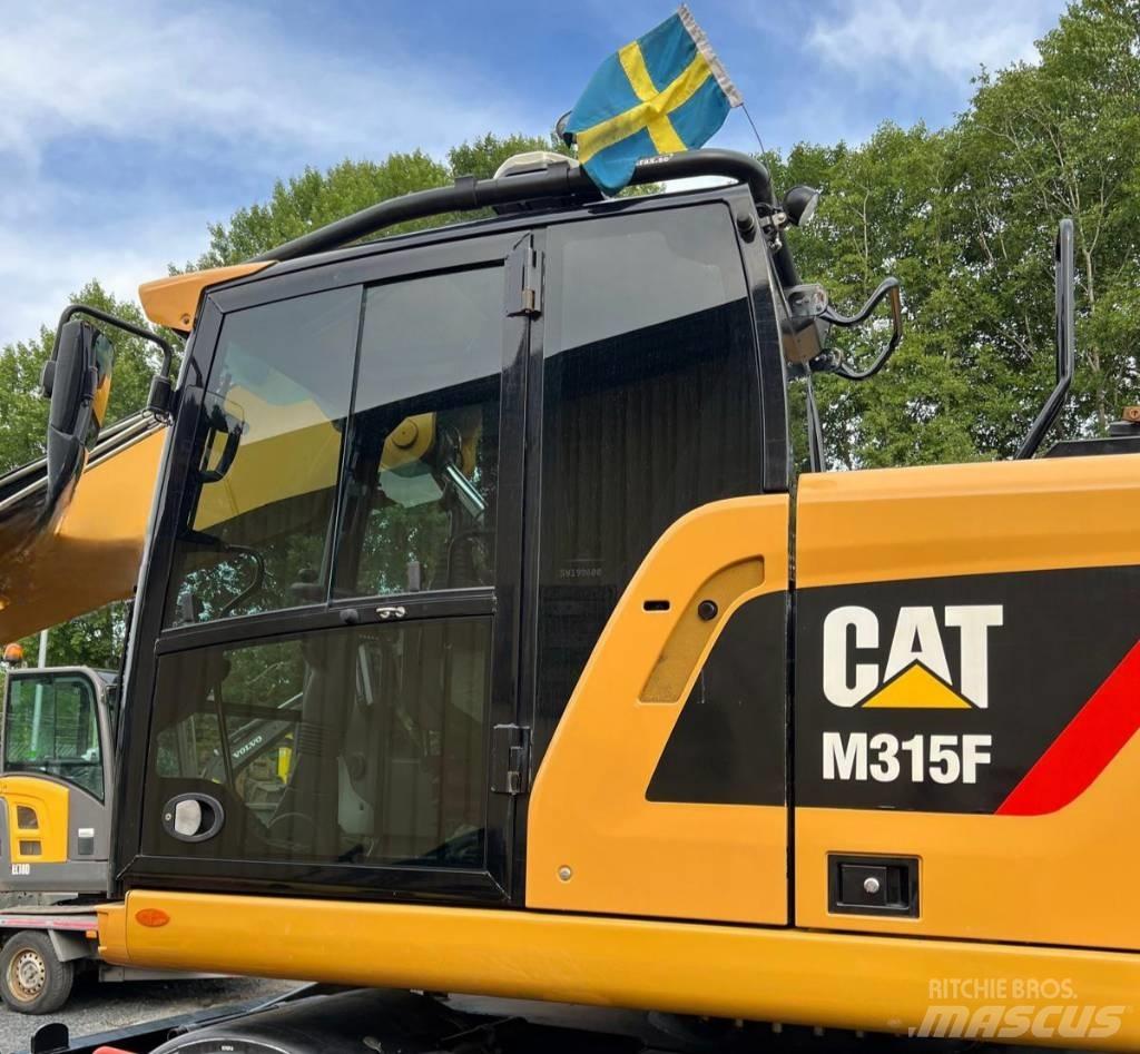 CAT 315 F Pelle sur pneus