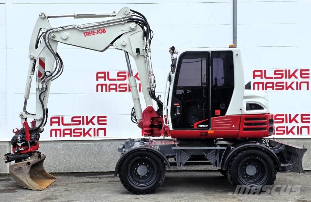 Takeuchi TB 295 W Pelle sur pneus