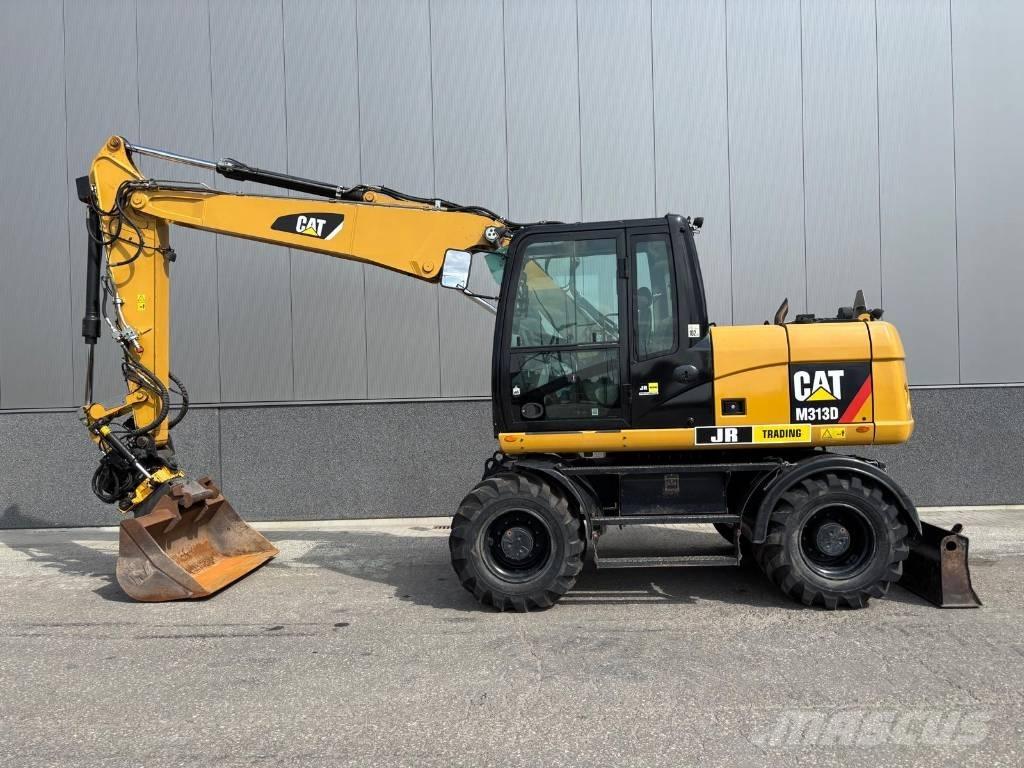 CAT M 313 D Pelle sur pneus