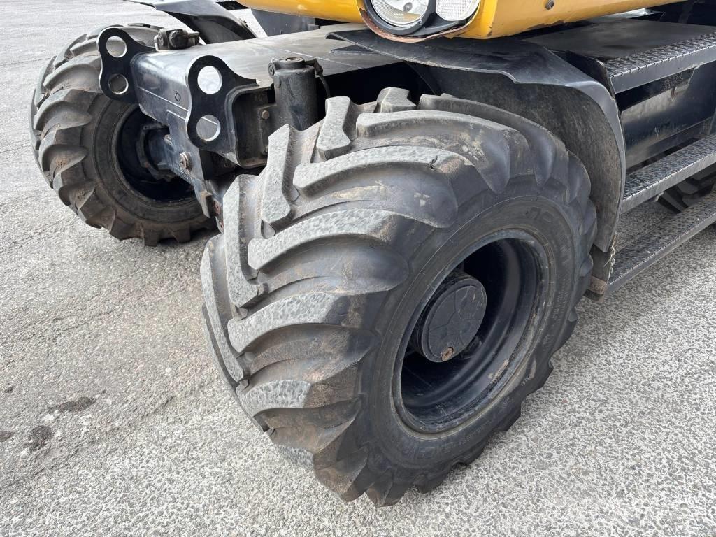 CAT M 313 D Pelle sur pneus