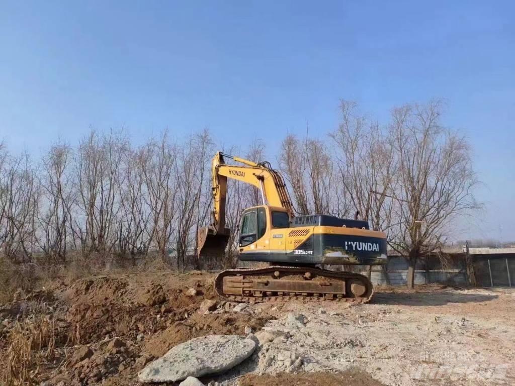 Hyundai R305LC-9T Pelle sur pneus