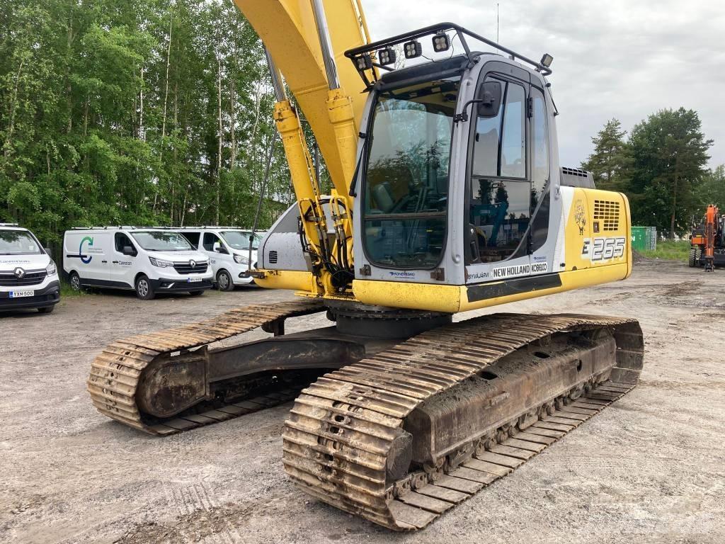 New Holland E 265 LC Pelle sur chenilles