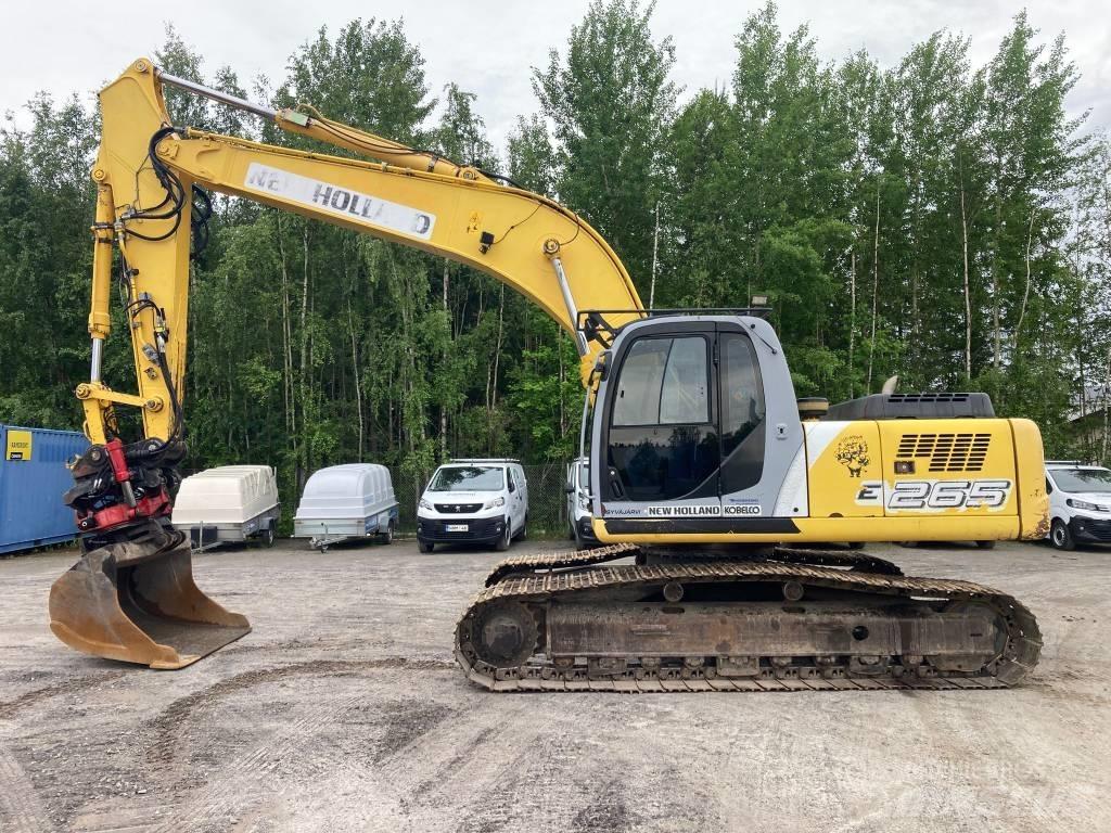 New Holland E 265 LC Pelle sur chenilles