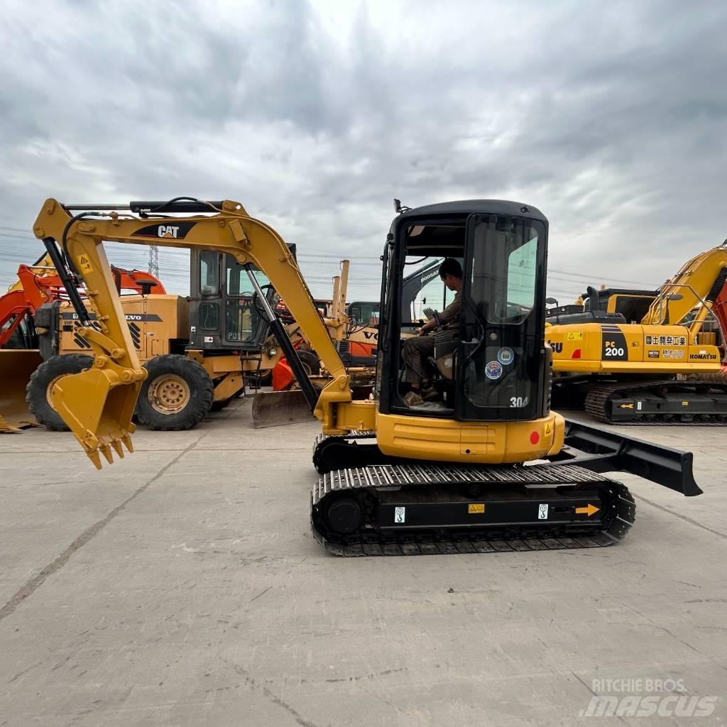 CAT 304 Pelle sur chenilles
