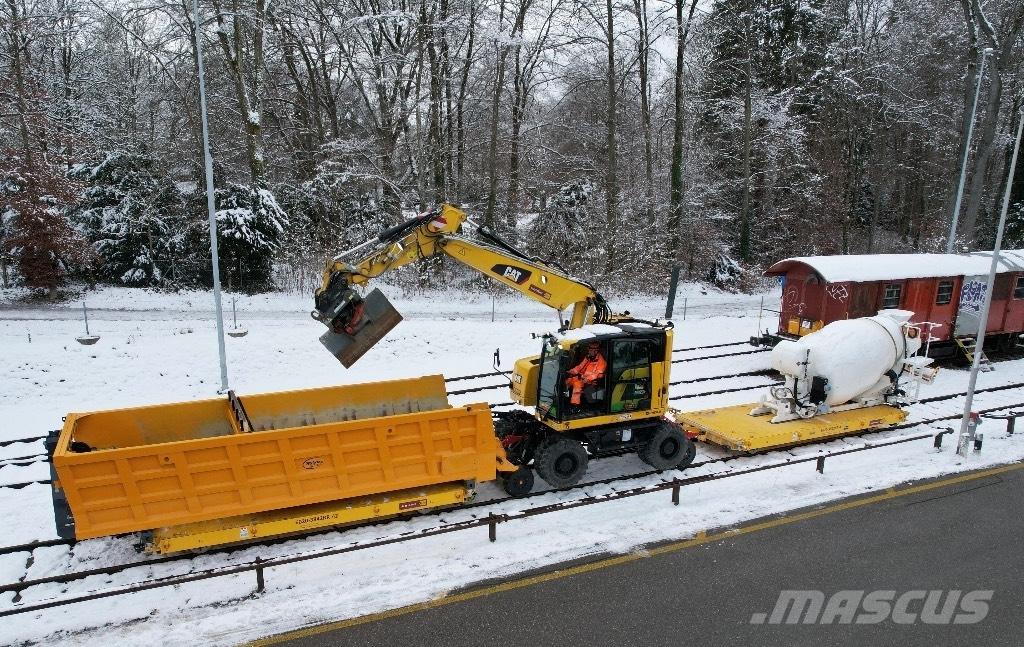 CAT 323 Rail Pelle spéciale