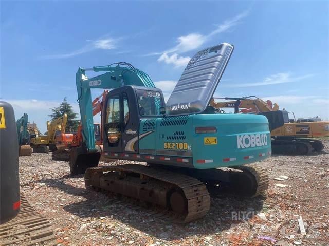 Kobelco SK210D Pelle sur chenilles