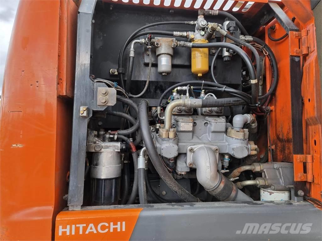 Hitachi ZX 140 W-3 Pelle sur pneus