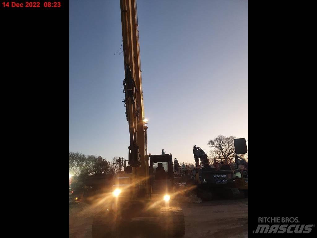 Komatsu PC210LC Pelle longue portée