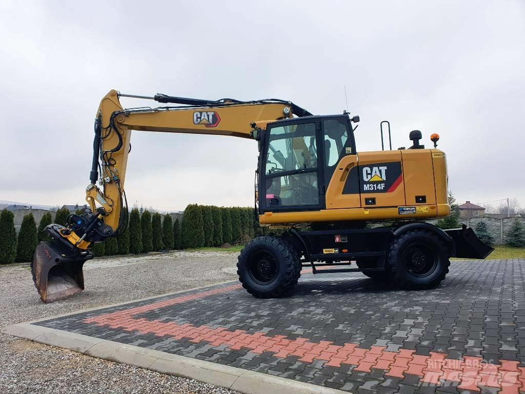 CAT M 314 F Pelle sur pneus