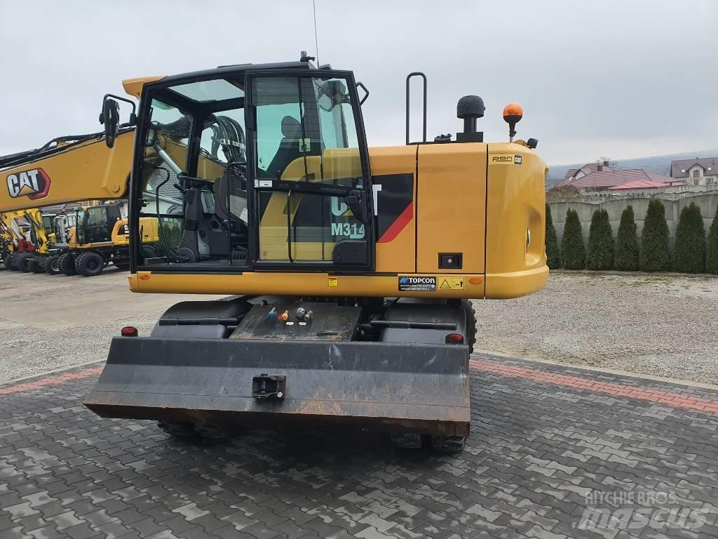 CAT M 314 F Pelle sur pneus