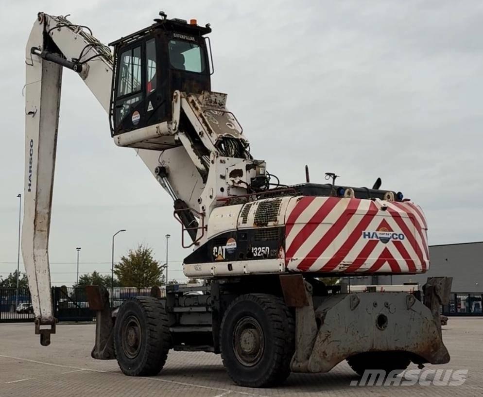 CAT M 325 D MH Pelle sur pneus