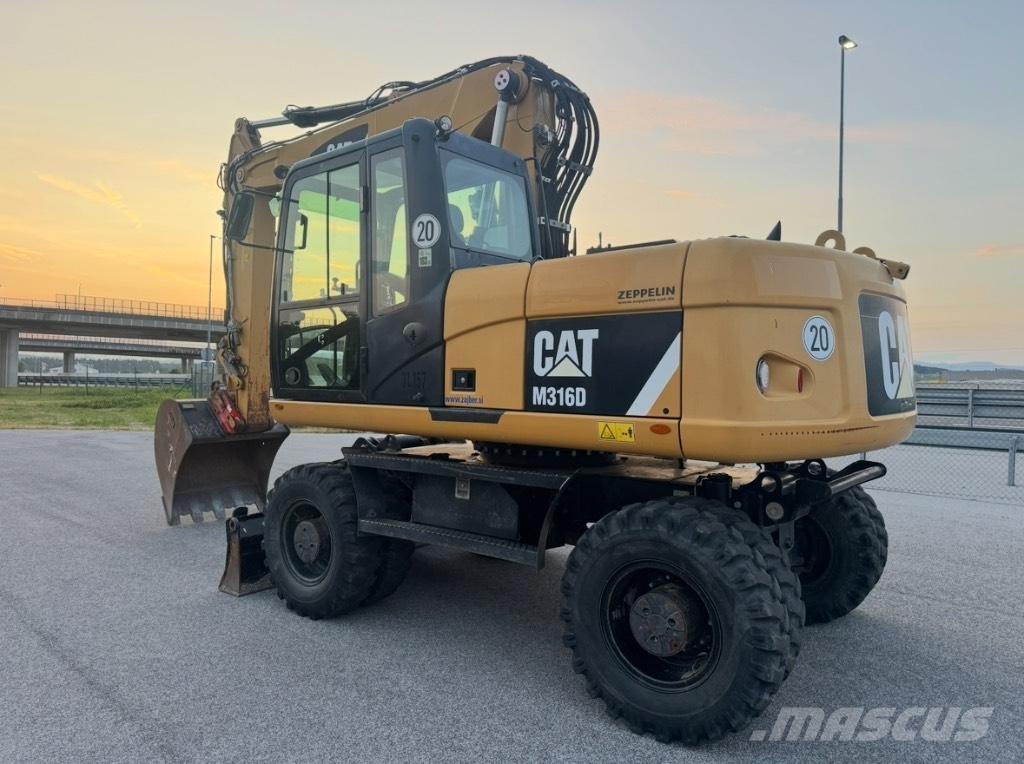CAT M 316 D Pelle sur pneus
