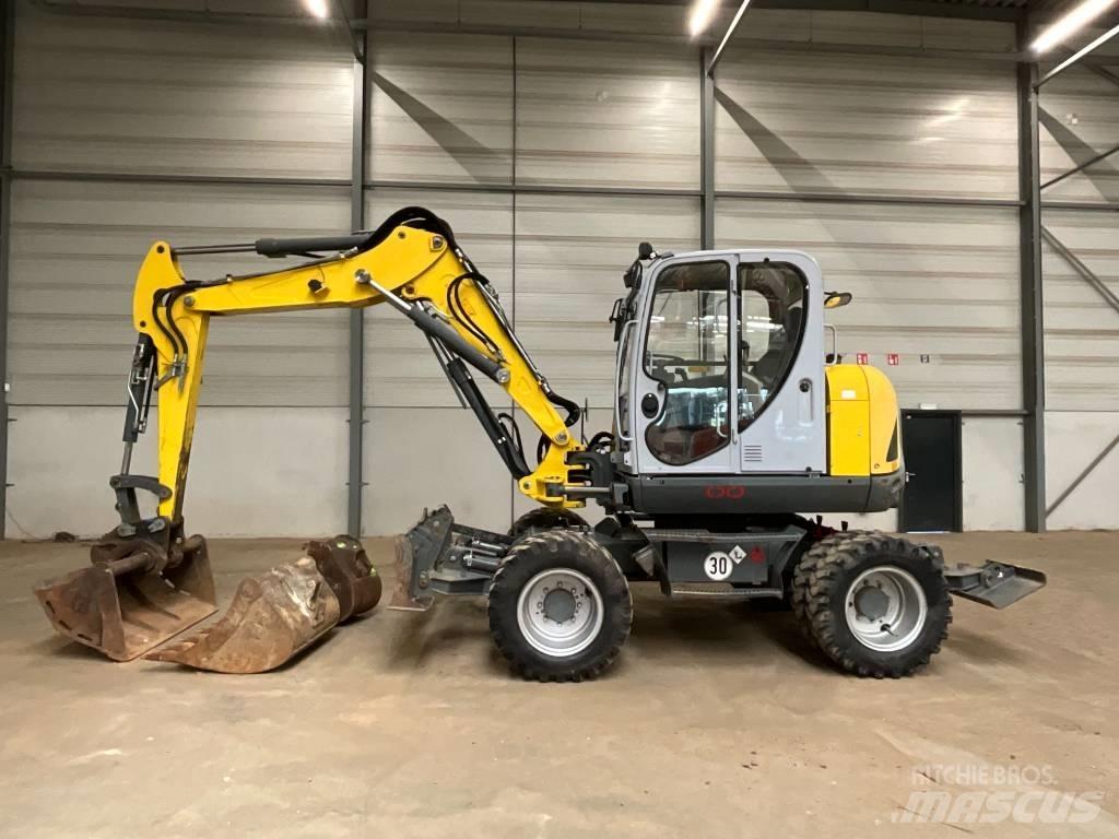 Neuson EW 100 Pelle sur pneus