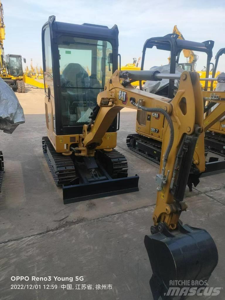 CAT 302 CR Pelle sur pneus