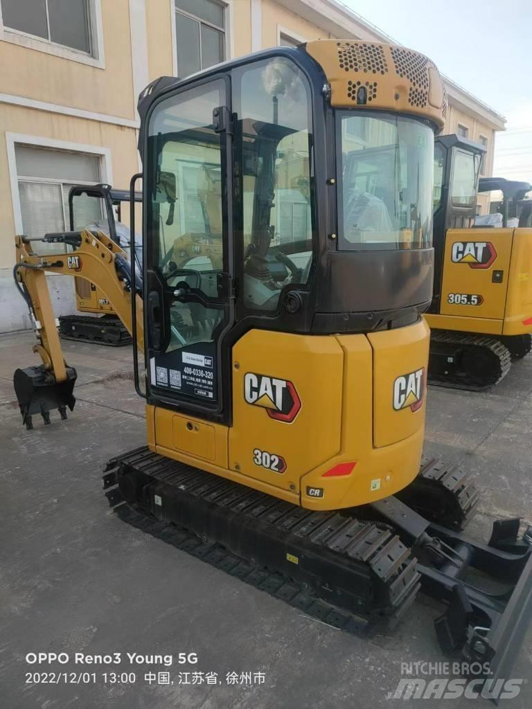 CAT 302 CR Pelle sur pneus