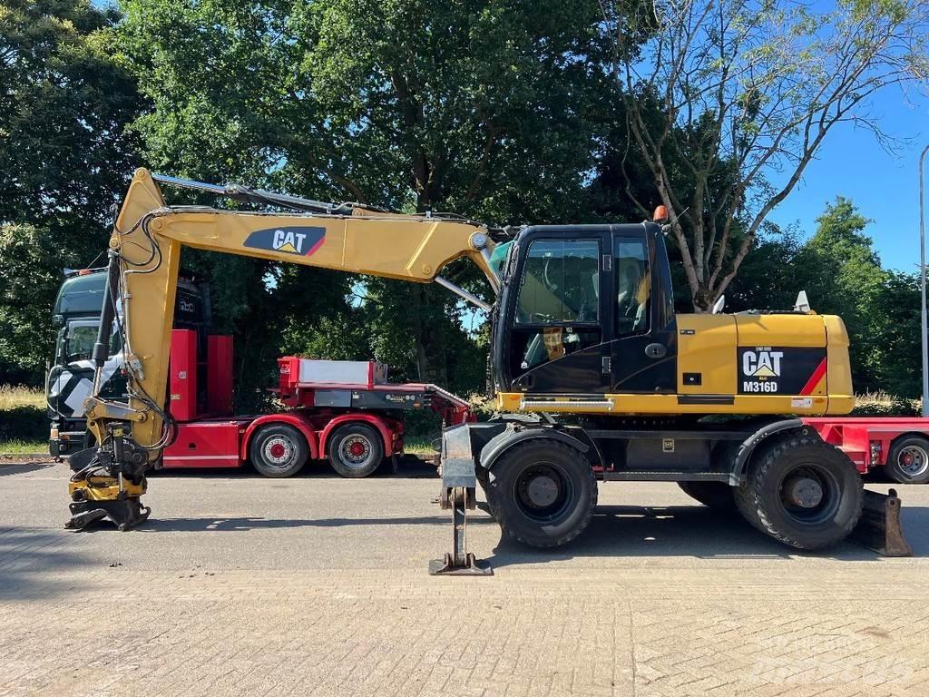 CAT M316D Pelle sur pneus