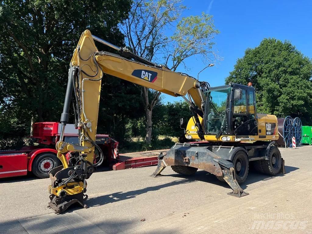 CAT M316D Pelle sur pneus