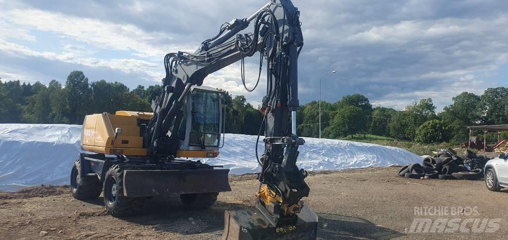 Atlas 1305 M Pelle sur pneus