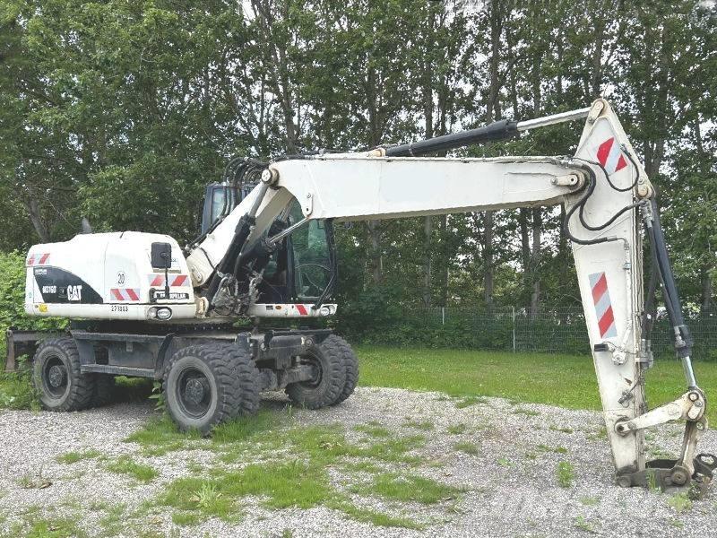 CAT M 316 D Pelle sur pneus