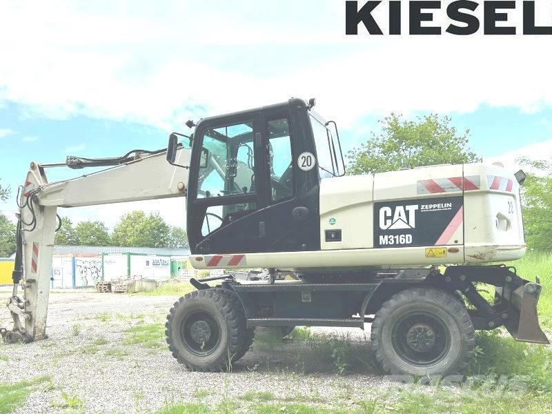CAT M 316 D Pelle sur pneus