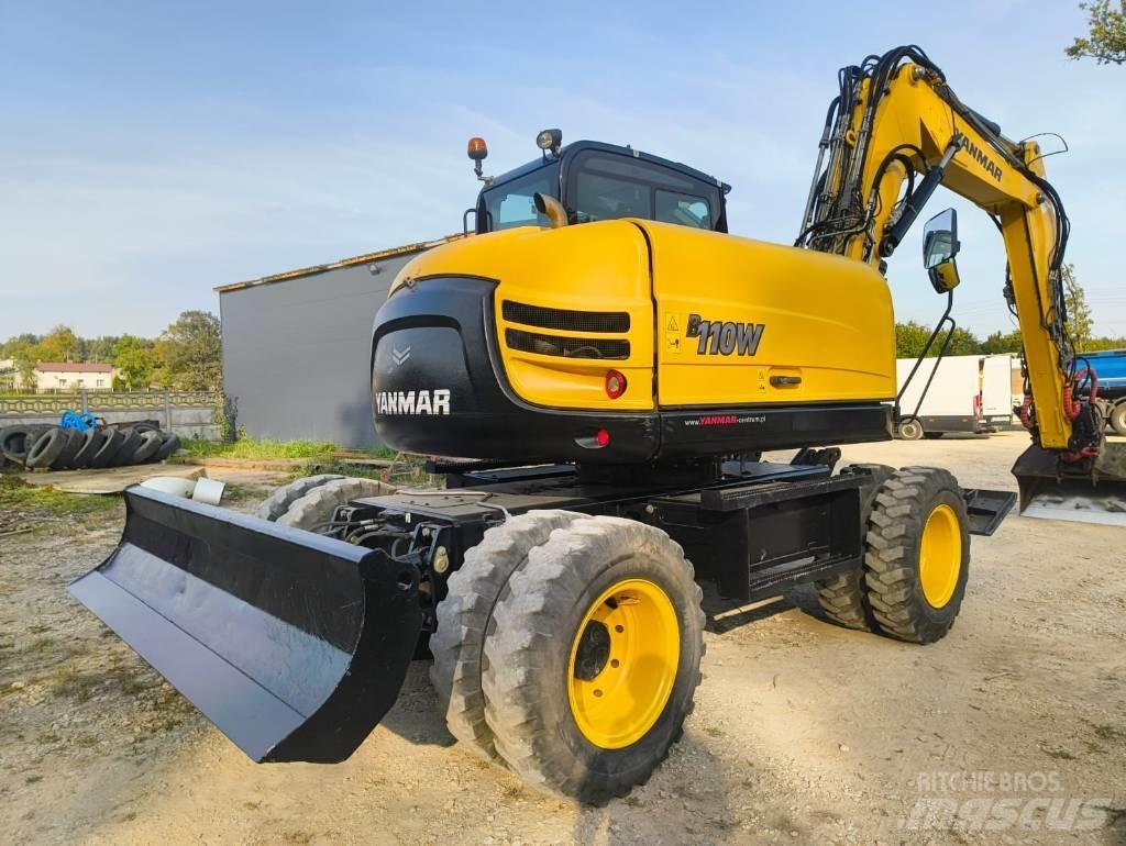 Yanmar B 110 W Pelle sur pneus