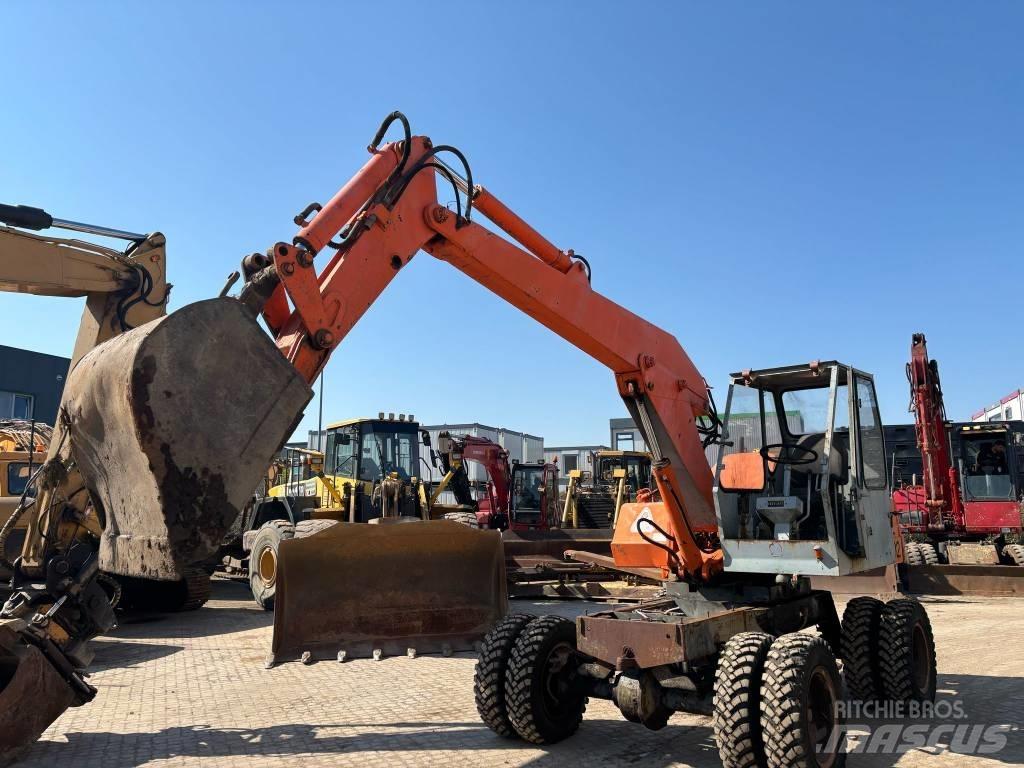 Atlas 120.2E Pelle sur pneus
