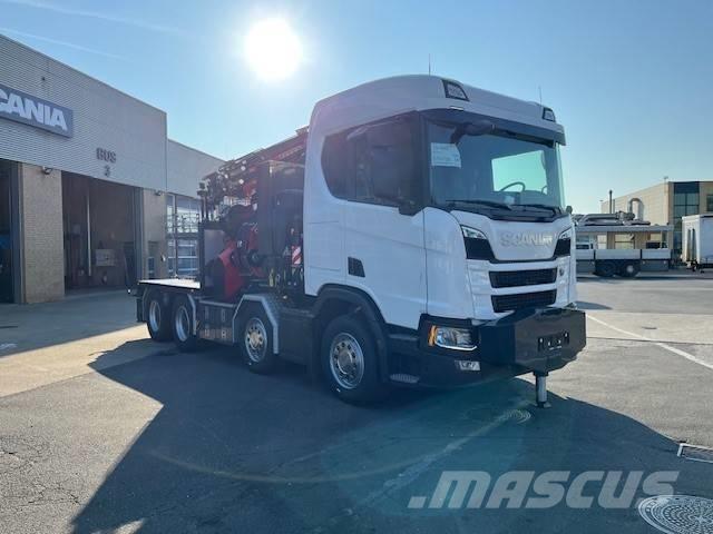 Scania R 560 Camion plateau ridelle avec grue