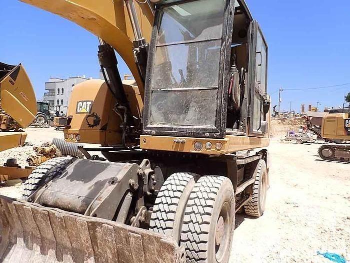 CAT M320F Pelle spéciale