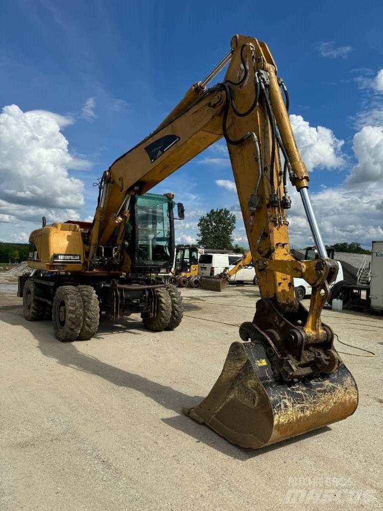 CAT 315 C Pelle sur pneus