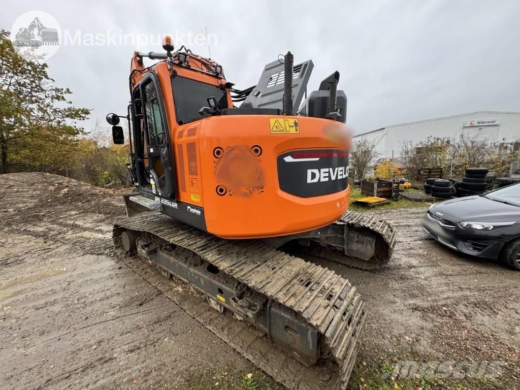 Develon DX 235 LCR Pelle sur chenilles