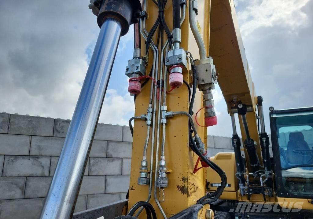 CAT M313 D Pelle sur pneus