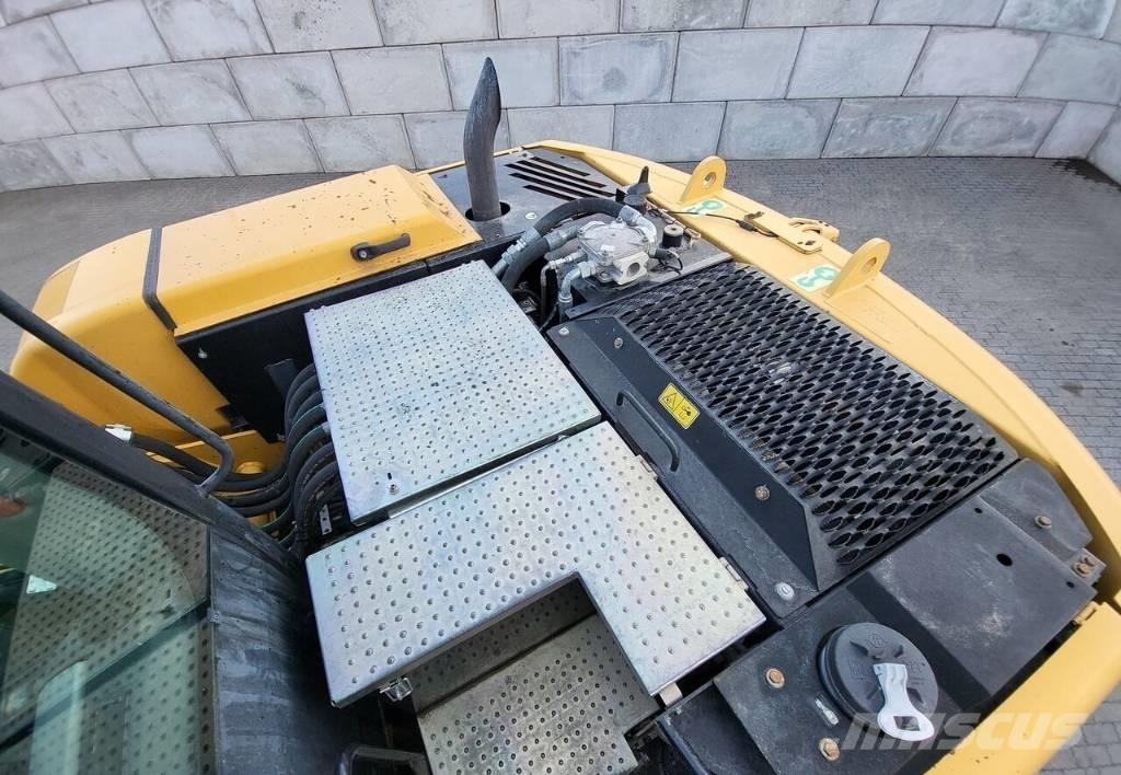 CAT M313 D Pelle sur pneus