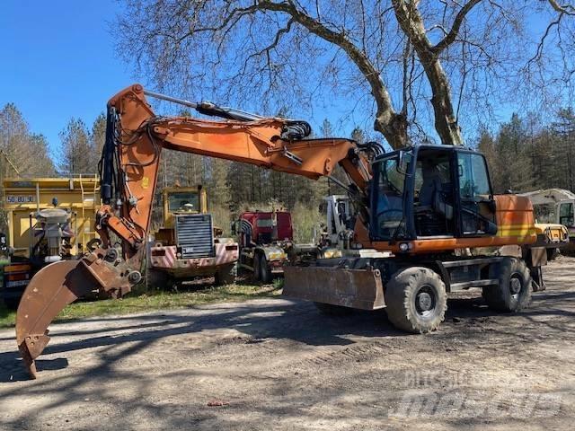 CAT M 316 D VAH Pelle sur pneus