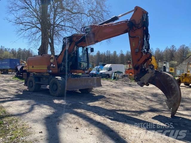 CAT M 316 D VAH Pelle sur pneus