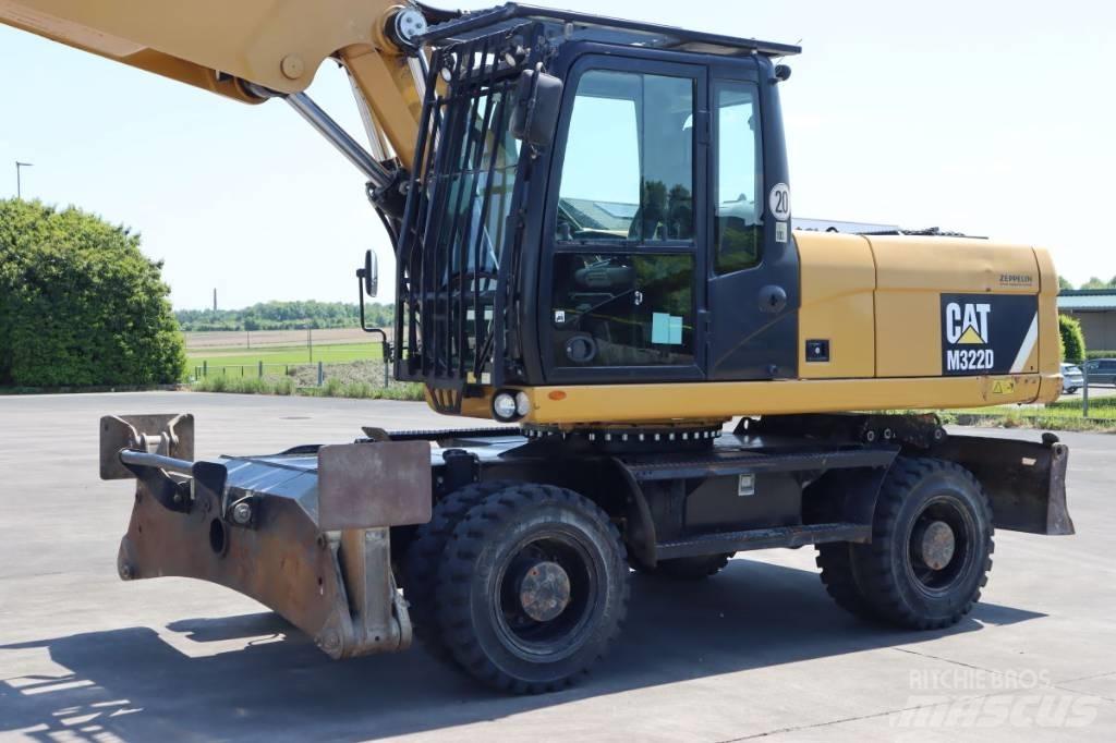 CAT M 322 D Pelle sur pneus