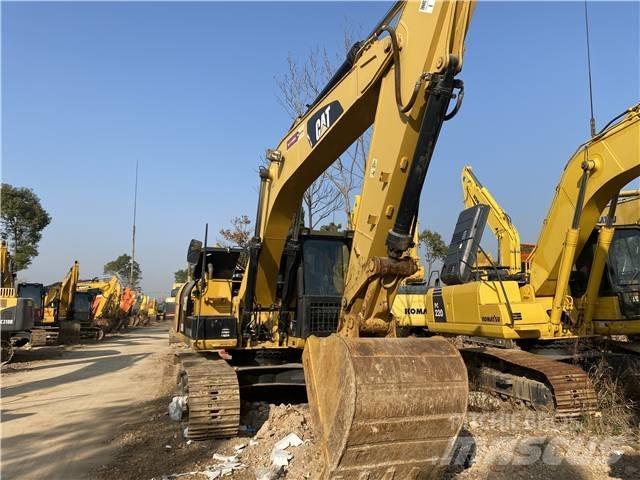 CAT 318D Pelle sur chenilles