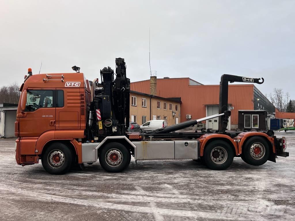 MAN Tgs 35.540 8x2-4 Camion plateau ridelle avec grue