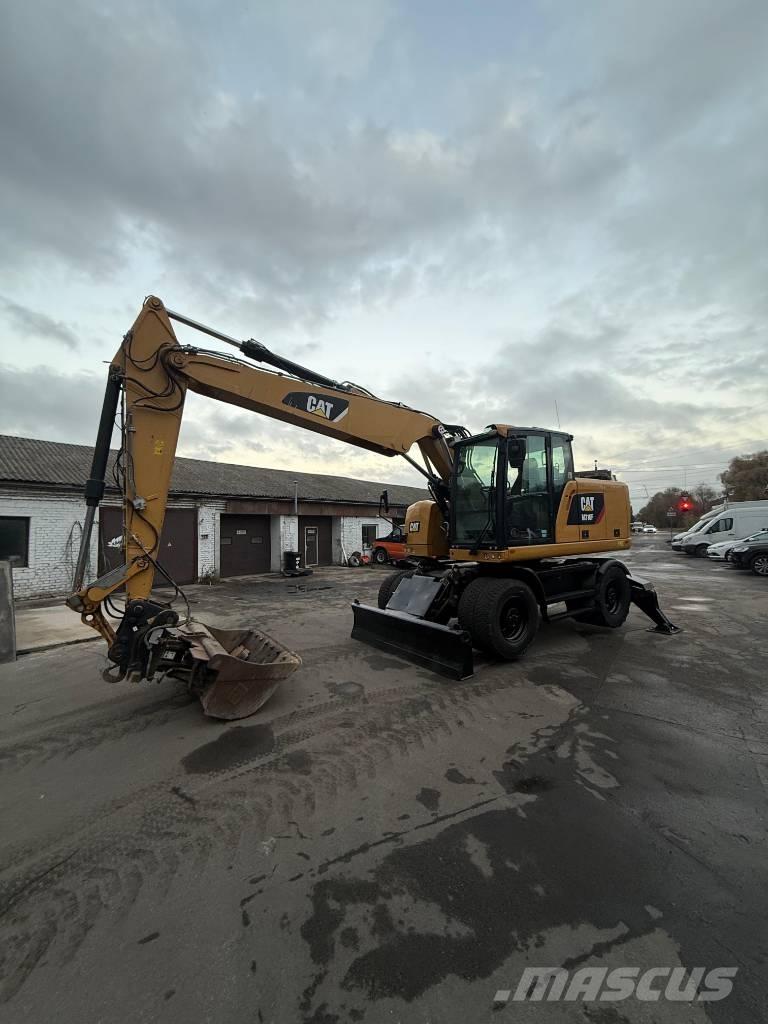 CAT M 316 F Pelle sur pneus