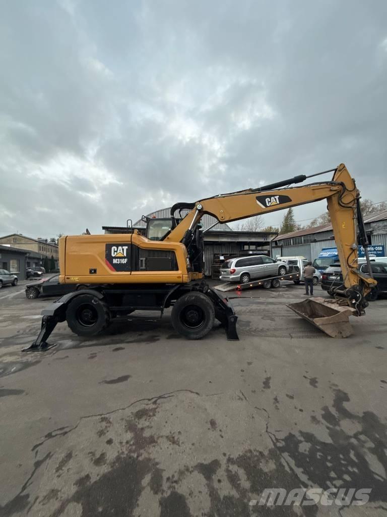 CAT M 316 F Pelle sur pneus